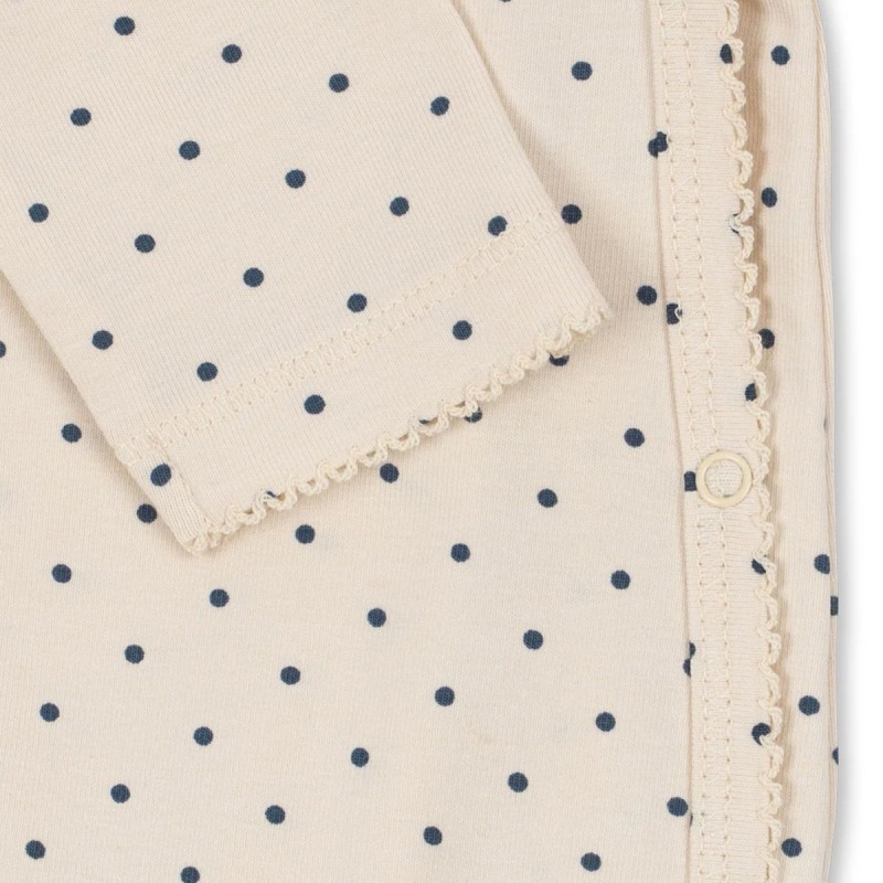 Combinaison bébé Konges Sløjd crème à pois et cerise